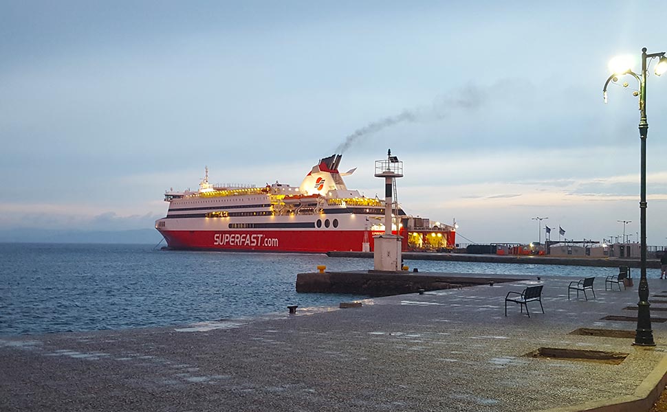 The superfast ship anchored at the pier of the port of Kos